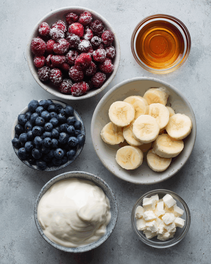 Ingredients for Berries Cottage Cheese Ice Cream neatly arranged