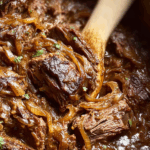 French Onion Pot Roast with caramelized onions and Gruyère cheese in a Dutch oven