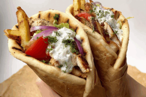 Greek Chicken Gyros freshly made with marinated chicken and tzatziki