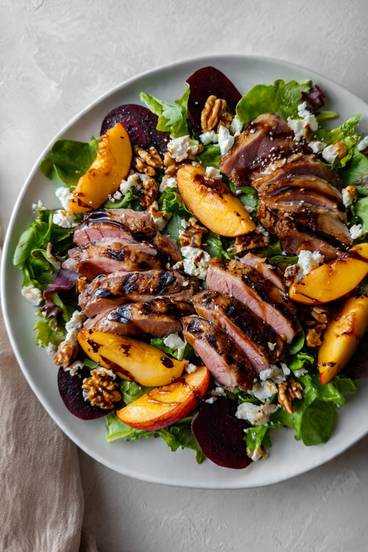Smoked duck & grilled peach salad